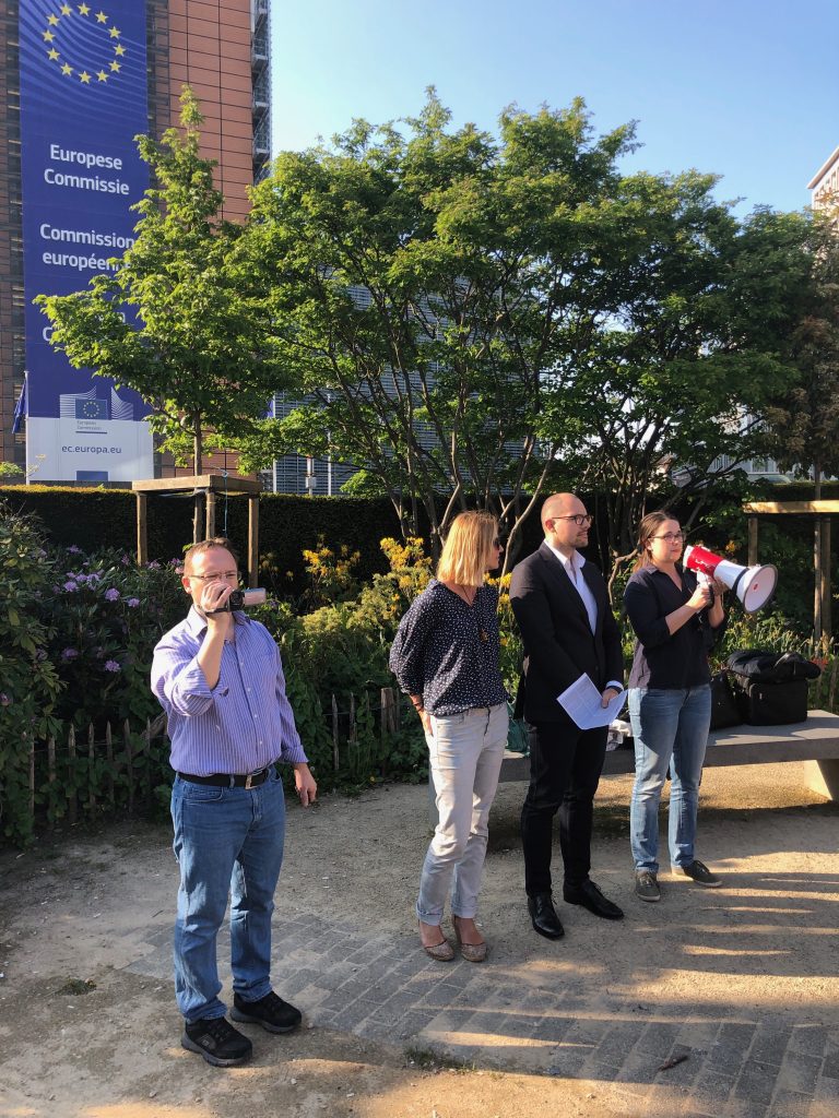 A small group of Slovak nationals at a rally for new Slovak elections in front of the European Commission. 